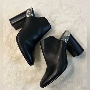 Dolce Vita heeled mules.